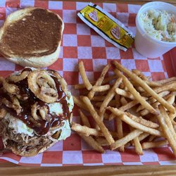 Smokey's Grille - The Big Smokey. Should be called a Hay Stack. Pulled pork piled too high to eat as a sandwich!