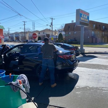 Contemporary Hand Carwash - Working hard drying cars. - Car Wash Near Me - Lyndhurst, New Jersey
