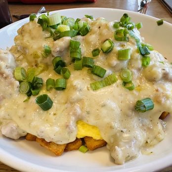 Scarlet Kitchen & Bar - Jalapeño-Cheddar biscuits, breakfast potatoes, and scrambled eggs topped with sausage gravy. - Breakfast & Brunch Near Me - Red Wing, Minnesota