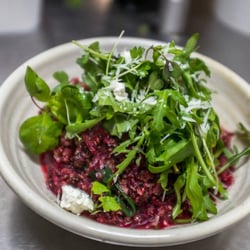 Little Sunflower Cafe - Quinoa risotto with beetroot, spinach and goats cheese. Image credit: Little Sunflower