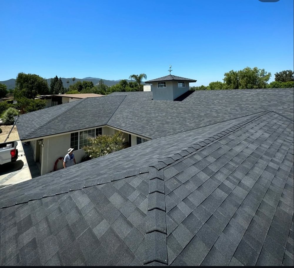 Slide of Simons Roofing Company