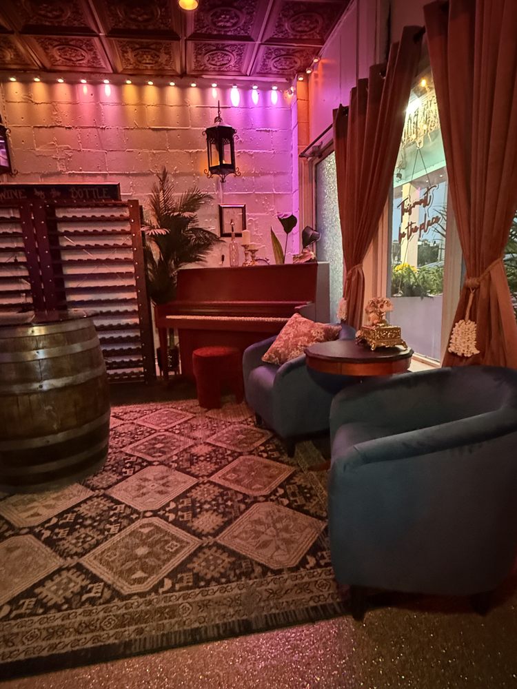 The Mermaid House Cafe & Wine Bar Logo