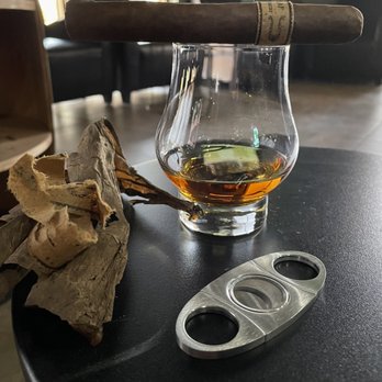 21 Degrees Cigar Lounge - a glass of whiskey and a cigar cutter - Tobacco Shops Near Me - Scottsdale, Arizona 21 Degrees Cigar Lounge - a glass of whiskey and a cigar cutter - Tobacco Shops Near Me - Scottsdale, Arizona