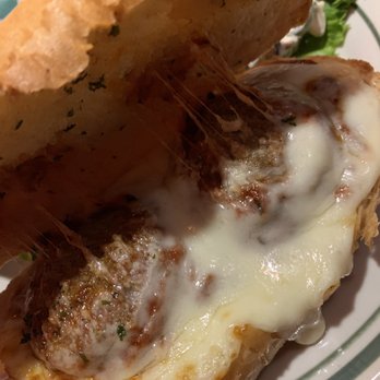 Monjunis Italian Cafe & Grocery - Better shot of the meatball poboy - Italian Near Me - Baton Rouge, Louisiana Monjunis Italian Cafe & Grocery - Better shot of the meatball poboy - Italian Near Me - Baton Rouge, Louisiana