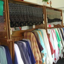 Fabrications - Bolts of linen and rolls of silk