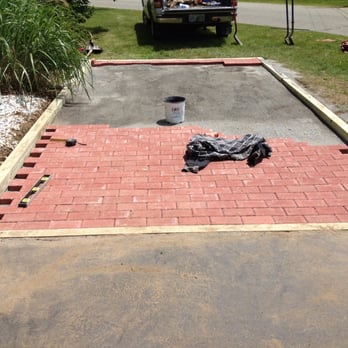 Going Green Seacoast Landscaping - a brick patio being laid - Landscaping Near Me - North Hampton, New Hampshire Going Green Seacoast Landscaping - a brick patio being laid - Landscaping Near Me - North Hampton, New Hampshire