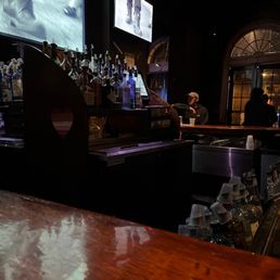 a man sitting at the bar a man sitting at the bar