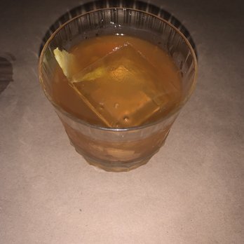 The Relief & Resource - a glass of liquid with a lemon wedge in it - Cocktail Bars Near Me - Fenton, Michigan The Relief & Resource - a glass of liquid with a lemon wedge in it - Cocktail Bars Near Me - Fenton, Michigan