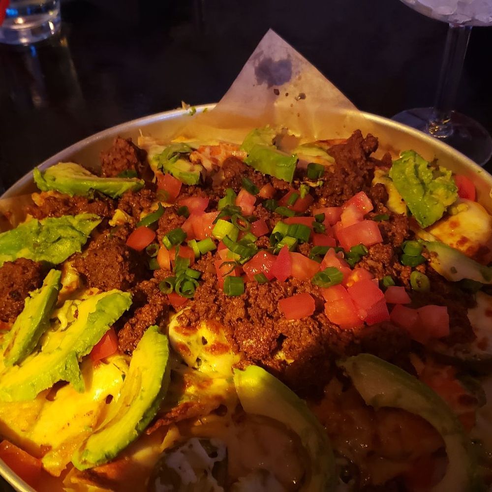 Gran Castor - The full plate of nachos with taco meat and grilled avocado both of which were an addition. - Latin American Near Me - Troy, Michigan Gran Castor - The full plate of nachos with taco meat and grilled avocado both of which were an addition. - Latin American Near Me - Troy, Michigan