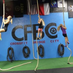 CrossFit Bridge City - Coach Carrie and two of her firebreathers in our CrossFit Kids Program