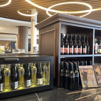 Vienna Lounge - Assorted alcoholic beverages.  Red and White wines - Airport Lounges Near Me