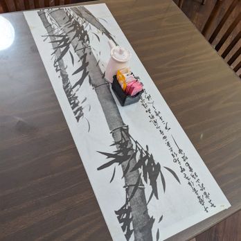 Origami - Table decor, looks like traditional Japanese ink painting sumi-e, each table had its own painting under the surface cover. - Japanese Near Me - Los Alamos, New Mexico Origami - Table decor, looks like traditional Japanese ink painting sumi-e, each table had its own painting under the surface cover. - Japanese Near Me - Los Alamos, New Mexico