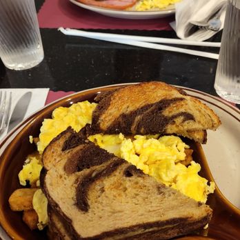 Newcomb's Cafe at Montilio’s - New england skillet in front. Ham and eggs in back. We like rye! - Breakfast & Brunch Near Me - Braintree, Massachusetts Newcomb's Cafe at Montilio’s - New england skillet in front. Ham and eggs in back. We like rye! - Breakfast & Brunch Near Me - Braintree, Massachusetts