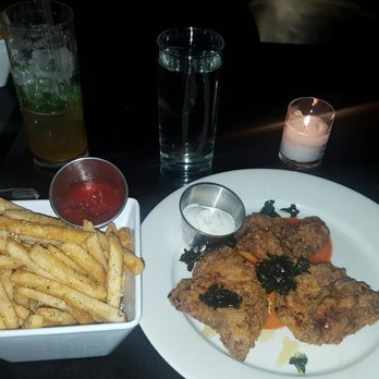 Charlies Bar & Kitchen - Rosemary Fries and Honey Hot Sauce Chicken Thighs - Cocktail Bars Near Me - Bronx, New York Charlies Bar & Kitchen - Rosemary Fries and Honey Hot Sauce Chicken Thighs - Cocktail Bars Near Me - Bronx, New York