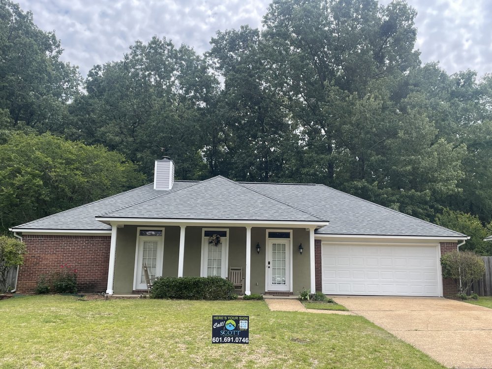 Slide of Scott Roofing