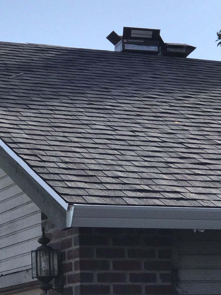 Slide of Ved's Roofing