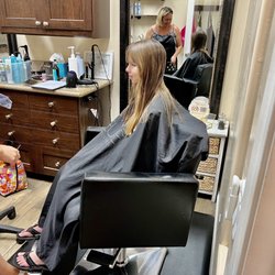 J Salon Studios & Spa - Jenn getting a trim