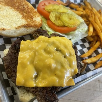 Mojo’s - Classic burger with Cajun fries. - Sports Bars Near Me - Dyersburg, Tennessee