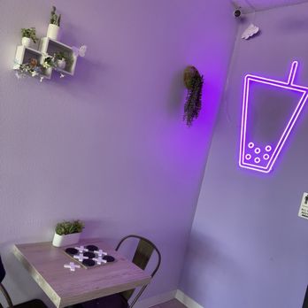Tea Be Honest - a purple neon sign on the wall - Bubble Tea Near Me - Indio, California Tea Be Honest - a purple neon sign on the wall - Bubble Tea Near Me - Indio, California