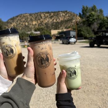 The Shop Coffee Co - Smores latte (center), iced matcha (right), hogwart latte (left) - Breakfast & Brunch Near Me - Orderville, Utah The Shop Coffee Co - Smores latte (center), iced matcha (right), hogwart latte (left) - Breakfast & Brunch Near Me - Orderville, Utah