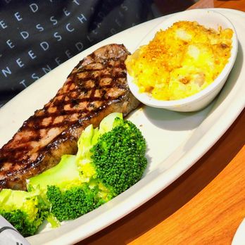 Black Angus Steakhouse - New York steak cooked perfectly (medium rare) with broccoli and au gratin potatoes - Steakhouses Near Me - Vancouver, Washington Black Angus Steakhouse - New York steak cooked perfectly (medium rare) with broccoli and au gratin potatoes - Steakhouses Near Me - Vancouver, Washington