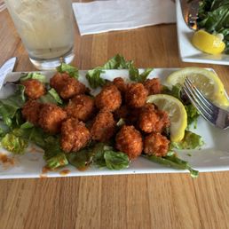 Grouper Bites tossed in Buffalo sauce. Grouper Bites tossed in Buffalo sauce.