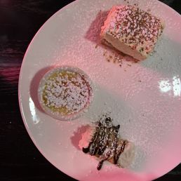 Tiramisu, creme brûlée and cannoli, all part of the trio sampler! Light, creamy and the perfect amount of sweet w/o being overbearing. Tiramisu, creme brûlée and cannoli, all part of the trio sampler! Light, creamy and the perfect amount of sweet w/o being overbearing.
