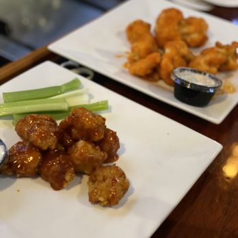 Harp & Hound - Pineapple jalapeño boneless wings & buffalo cauliflower - Irish Pub Near Me - Islip, New York