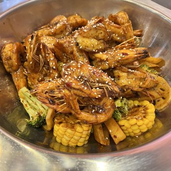 ShrimpMan - First course choice of shrimp + veggies pot or chicken wings and frog legs.  Picked the shrimp of course since the place is called shrimpman - Seafood Near Me - Toronto, Ontario