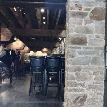 Windsor Mill Tavern - Foyer and entrance of the restaurant. The bar is in the middle. - Bars Near Me - Windsor, Colorado