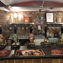 Hook Norton Brewery Visitor Centre - Tap room at the end of the tour at Hook Norton Brewery in Hook Norton, UK.