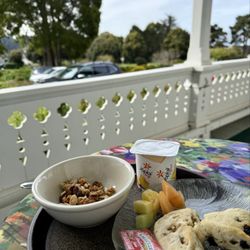 Joshua Grindle Inn - Breakfast on the patio, scones, granola, fruits, yogurt