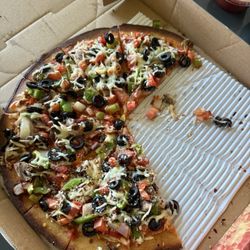 Sahara pizza - Burnt vegan veggie pizza.