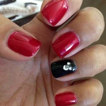 Jo Nails 2 - Shellac manicure with Mickey Mouse design on ring finger - Nail Salons Near Me - Manteca, California Jo Nails 2 - Shellac manicure with Mickey Mouse design on ring finger - Nail Salons Near Me - Manteca, California