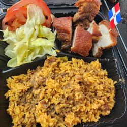Sabor Cibaeno - Rice with guandules chicharron and salad.