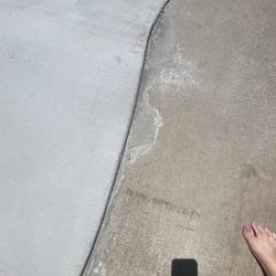 JB’s Landscaping - Over hang of concrete that they didn't smooth out to be flush with my existing