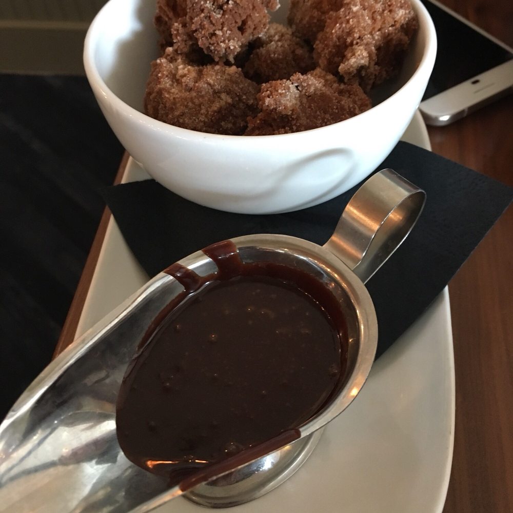 Benedict's - Mini donuts - comes with a chocolate sauce - Breakfast & Brunch Near Me - Wayzata, Minnesota Benedict's - Mini donuts - comes with a chocolate sauce - Breakfast & Brunch Near Me - Wayzata, Minnesota
