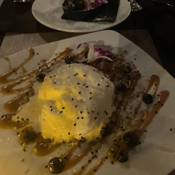Beeside Balcony - Pineapple dessert topped with coconut ice cream. - Mediterranean Near Me - Del Mar, California