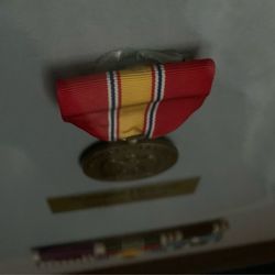Art Alley and Frame Clinic - Medal not well adhered with glue