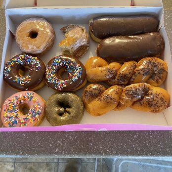 Altus Donuts and Fried Rice - Smorgasbord of delicious donuts! Can you tell the type I nibbled on while driving home? - Donuts Near Me - Altus, Oklahoma