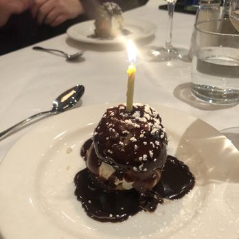 Mon Ami Gabi - My birthday profiterole. - French Near Me - Bethesda, Maryland Mon Ami Gabi - My birthday profiterole. - French Near Me - Bethesda, Maryland