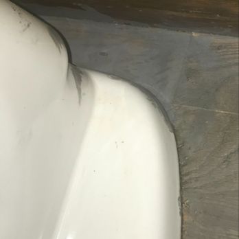Park Place Interiors - Inconsistent color & splotchy staining around toilet after refinish #1. Additional stain contamination present. - Flooring Near Me - Windsor, Colorado
