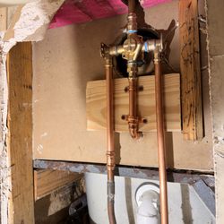 Raymond Bros Plumbing - Shower valve install .