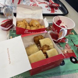 ows two boxes of food on a table ows two boxes of food on a table