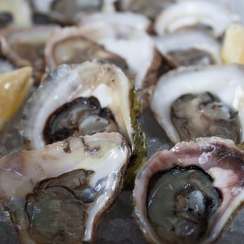 Shuck Seafood and Raw Bar - Shucker's dozen (13 local oysters) - $36 - Seafood Near Me - Halifax, Nova Scotia