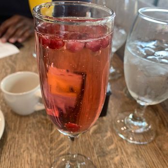 Brown Hound Downtown - Cranberry Elderflower Mimosa - New American Near Me - Rochester, New York Brown Hound Downtown - Cranberry Elderflower Mimosa - New American Near Me - Rochester, New York