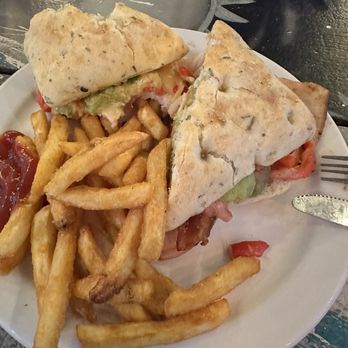 Sharkeys - Gouda Grill (grilled turkey, guacamole, roasted red peppers, bacon, and gouda on focaccia) - American Near Me - Key Largo, Florida Sharkeys - Gouda Grill (grilled turkey, guacamole, roasted red peppers, bacon, and gouda on focaccia) - American Near Me - Key Largo, Florida
