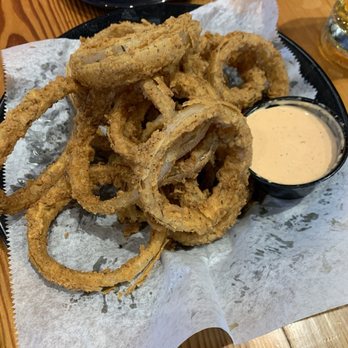 Double Dogs - Gallatin - Onion rings with creamy smoked tomato horseradish sauce - Sports Bars Near Me - Gallatin, Tennessee Double Dogs - Gallatin - Onion rings with creamy smoked tomato horseradish sauce - Sports Bars Near Me - Gallatin, Tennessee