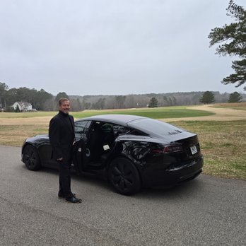 SkyView Comfort Ride Services - Capt Mike of SkyView Comfort Ride Services next to the whisper-quiet futuristic Tesla Model S - Limos Near Me - Eatonton, Georgia SkyView Comfort Ride Services - Capt Mike of SkyView Comfort Ride Services next to the whisper-quiet futuristic Tesla Model S - Limos Near Me - Eatonton, Georgia