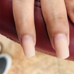 Tracy Nails - I had to change from white tip with pink because color couldn't  match. The pink!  would never recommend such a place!